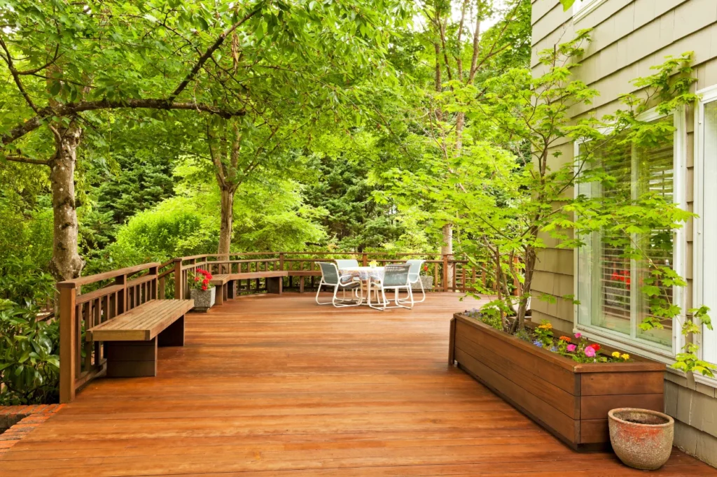 Wooden deck surrounded by greenery showcasing the about us story at Deck Builders Taupo.