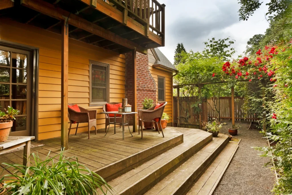 Cozy garden deck with seating designed as part of tailored custom decks by Deck Builders Taupo.