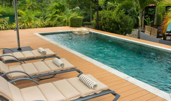 Poolside decks designed by Deck Builders Taupo, built with materials that are stylish, durable, and easy to keep clean.